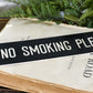 No smoking please sign